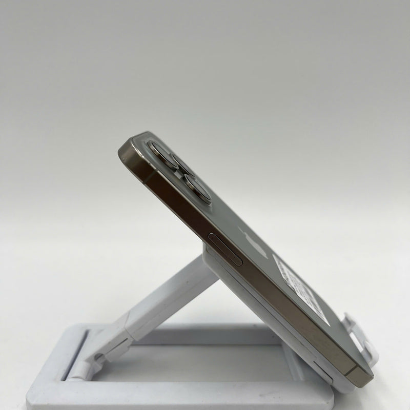 iPhone 15 Pro 128GB Natural 98% battery 86% International from DCM (No DCM sim - 0.5x spots, scratched edges, scratched orange edges) - HH7932 