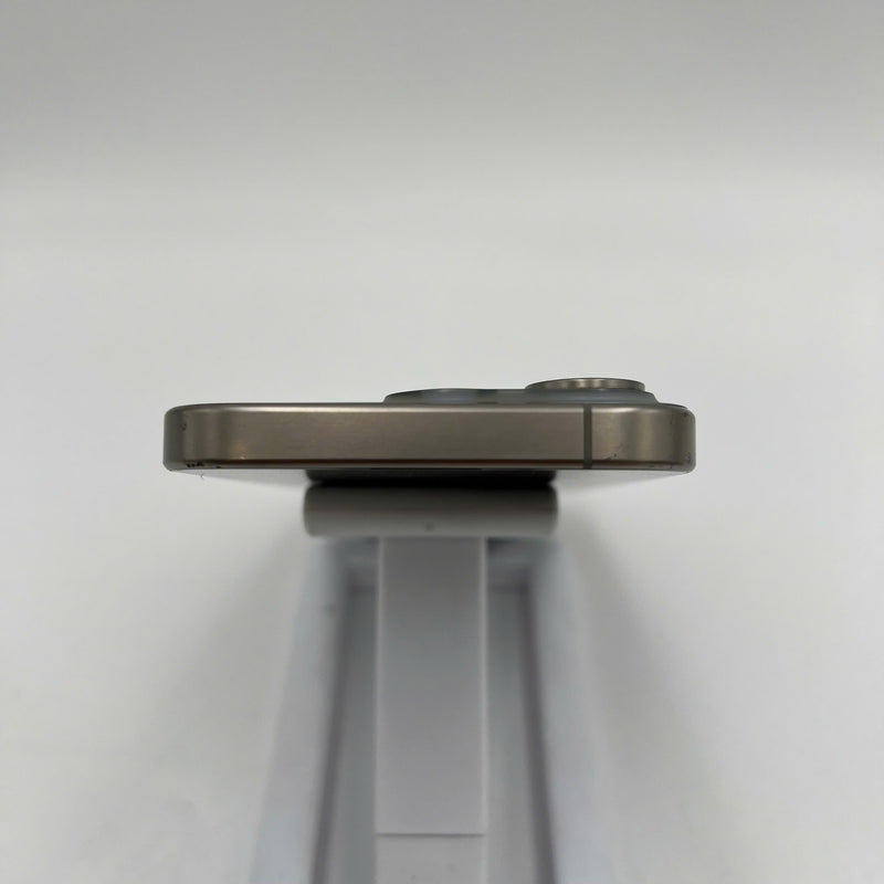 iPhone 15 Pro 128GB Natural 98% battery 86% International from DCM (No DCM sim - 0.5x spots, scratched edges, scratched orange edges) - HH7932 