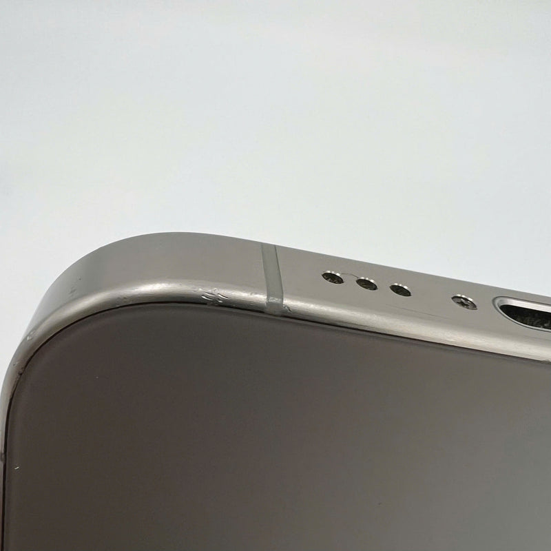 iPhone 15 Pro 128GB Natural 98% battery 86% International from DCM (No DCM sim - 0.5x spots, scratched edges, scratched orange edges) - HH7932 