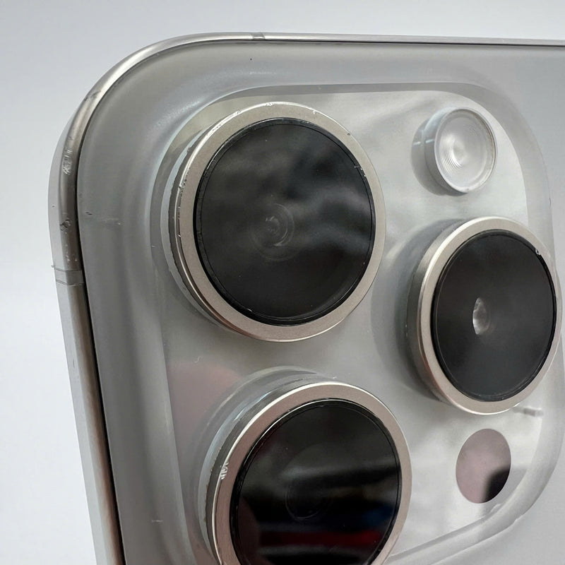 iPhone 15 Pro 128GB Natural 98% battery 86% International from DCM (No DCM sim - 0.5x spots, scratched edges, scratched orange edges) - HH7932 