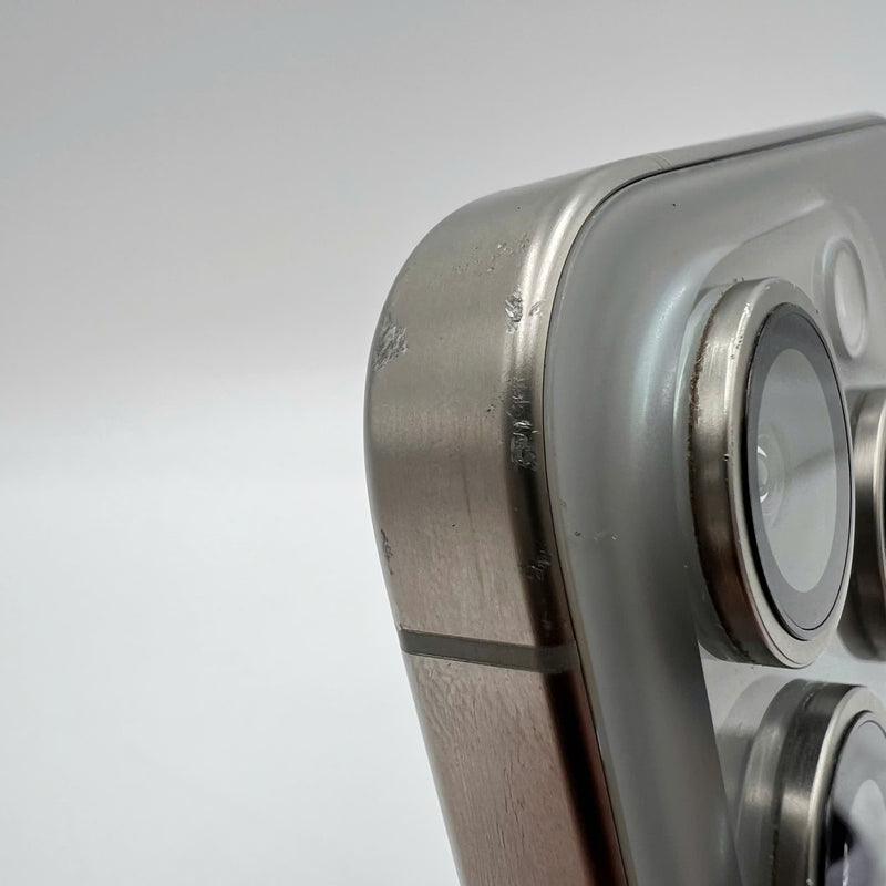 iPhone 15 Pro 128GB Natural 98% battery 86% International from DCM (No DCM sim - 0.5x spots, scratched edges, scratched orange edges) - HH7932 