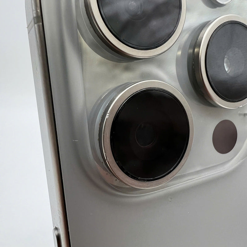 iPhone 15 Pro 128GB Natural 98% battery 86% International from DCM (No DCM sim - 0.5x spots, scratched edges, scratched orange edges) - HH7932 