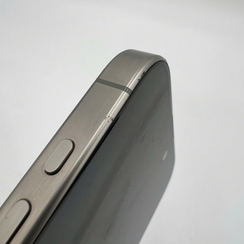 iPhone 15 Pro 128GB Natural 98% battery 86% International from DCM (No DCM sim - 0.5x spots, scratched edges, scratched orange edges) - HH7932 