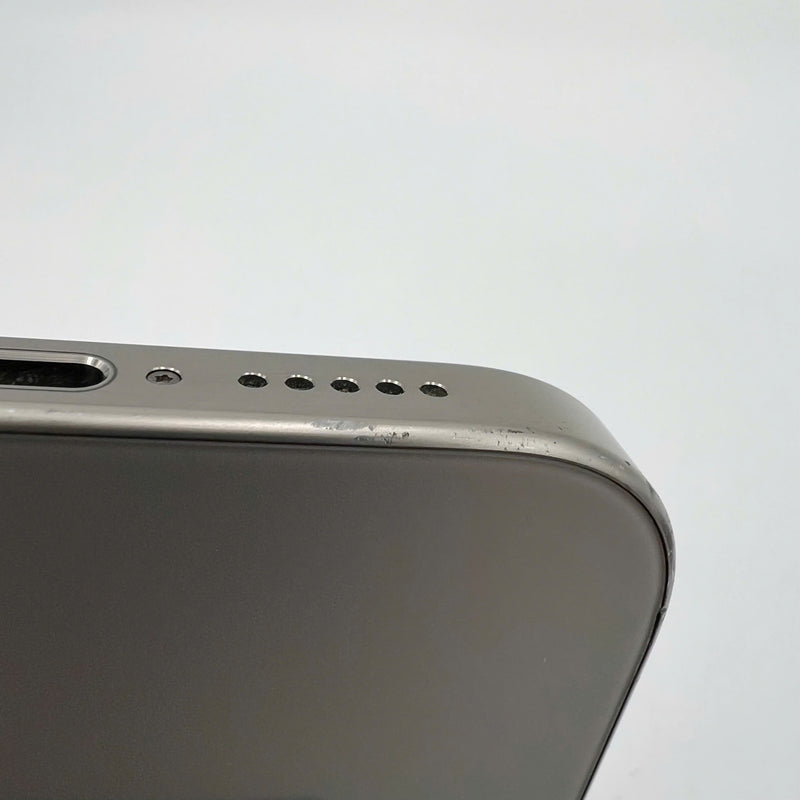 iPhone 15 Pro 128GB Natural 98% battery 86% International from DCM (No DCM sim - 0.5x spots, scratched edges, scratched orange edges) - HH7932 